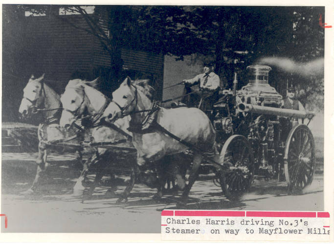 May 21, 1911 Fireman Charles Harris driving steamer from Fire Station No. 3